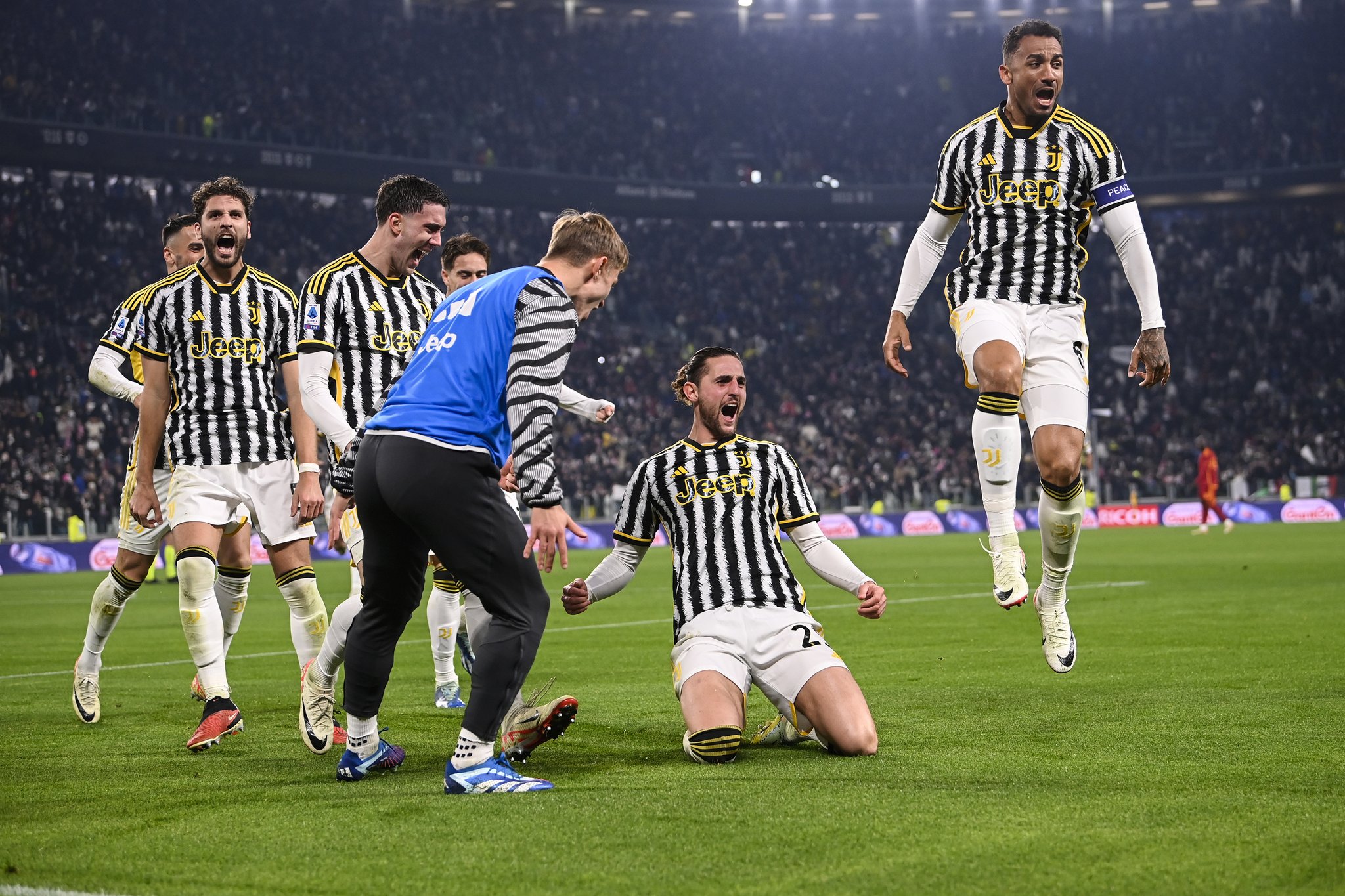 Adrien Rabiot celebrating with his juventus teammates