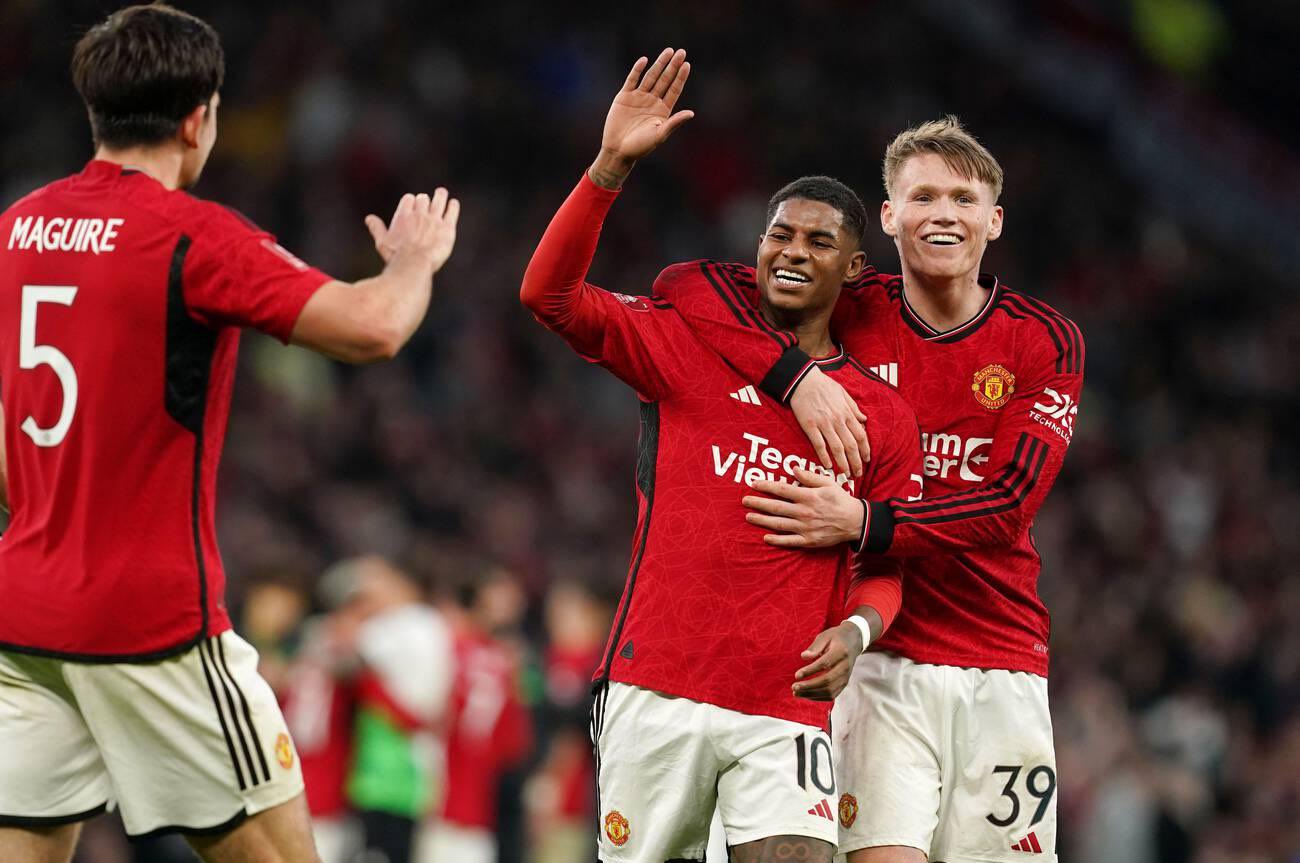 Marcus Rashford celebrating with Mctominay and Maguire